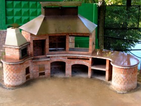 An example of a pergola with barbecue