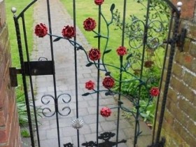 Wrought iron gate with roses