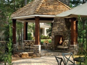 Wooden gazebo with barbecue