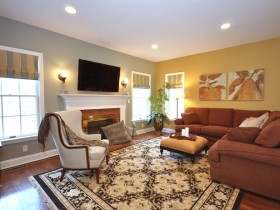 The spacious living room with fireplace