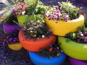 Creative flowerbed with their hands