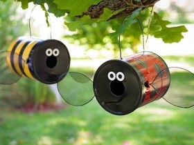 Bird feeders out of cans with coffee