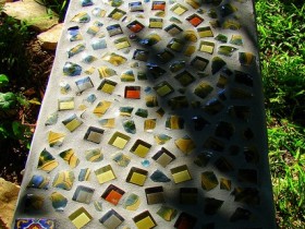 Garden bench with mosaic