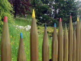 The fence in the form of pencils