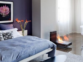 Modern master bedroom with fireplace