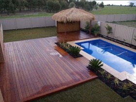 A relaxation area with a swimming pool in the style of hi-tech