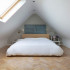 Bedroom with sloping ceiling