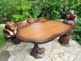 Carved wooden table for the garden