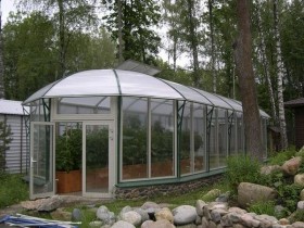 the design of a greenhouse at their summer cottage