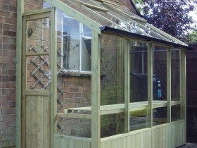 Wooden greenhouse, attached to the house