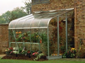 Glass greenhouse in the country