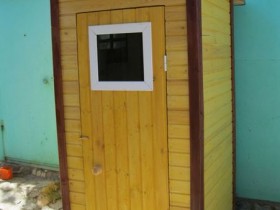 Modern country toilet made of wood