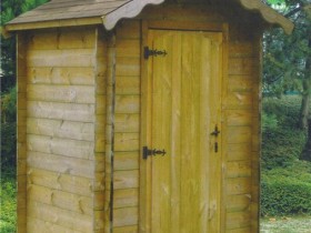 Wooden outdoor toilet in the country