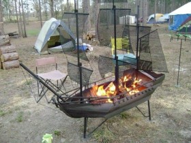 Outdoor grill in the shape of a ship