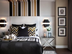 Красивая спальня с полосками в качестве изюминок дизайна